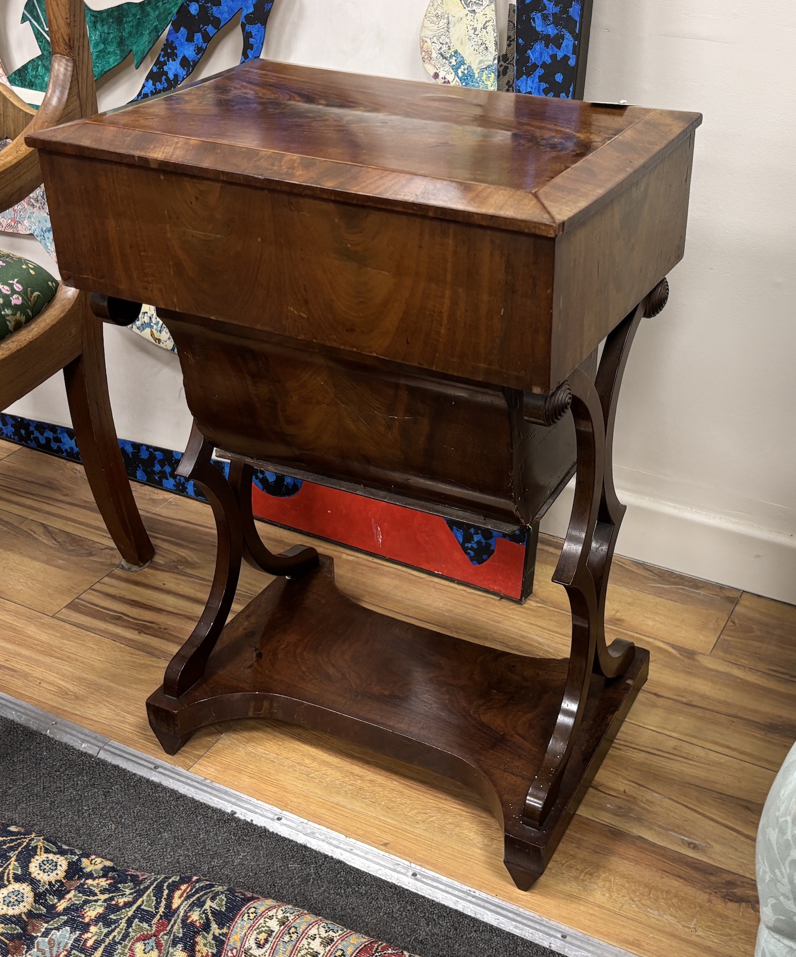 An early 19th century Dutch rectangular mahogany sewing table, width 49cm, depth 34cm, height 72cm